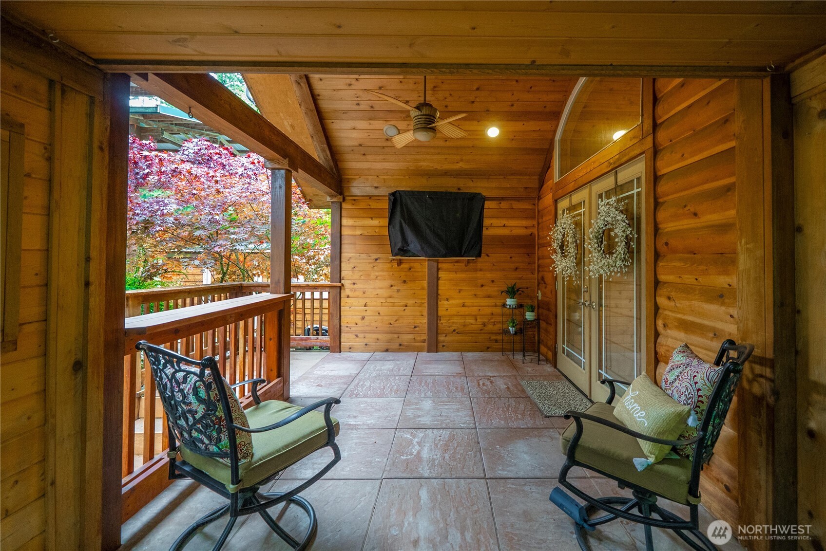 1546 Reservation Road Southeast, Unit 149 Olympia, WA 98513 - Photo 19 of 38 a view of a porch with furniture and a gate