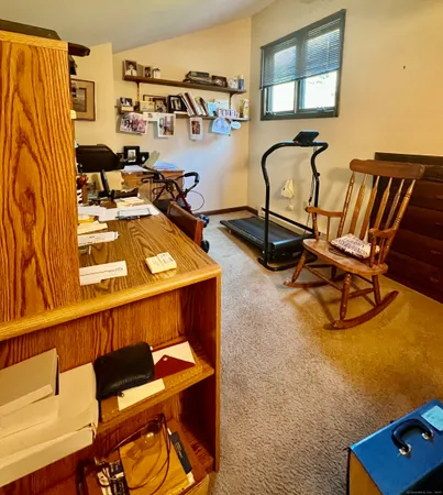 a view of a street with benches in the background