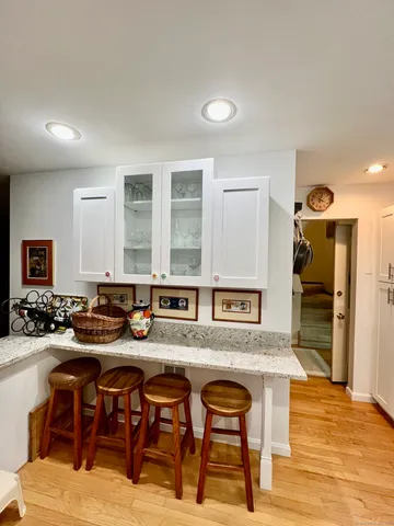 a dinning table and chairs in a room