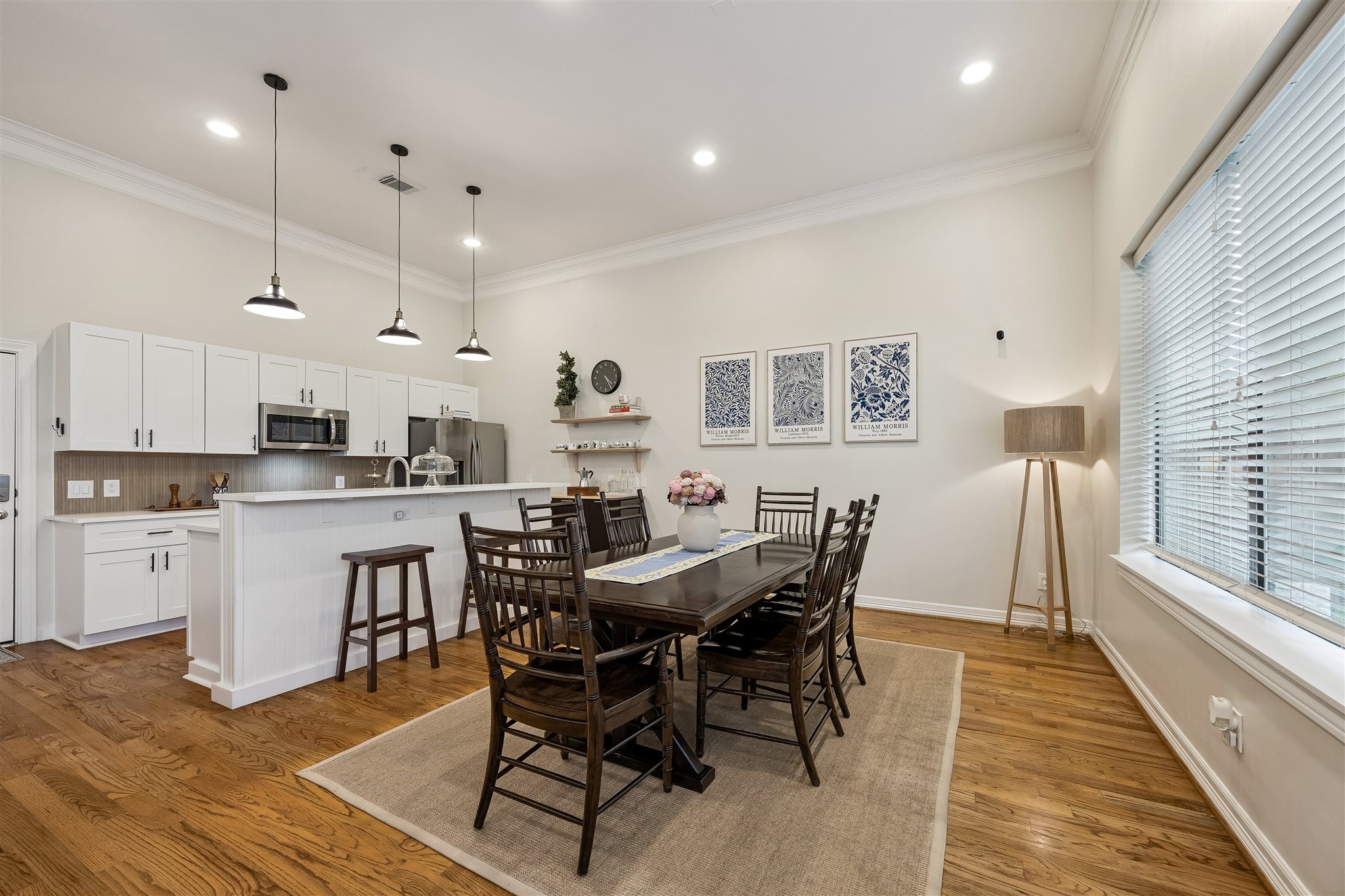 Kitchen/dining room combo.  High breakfast bar provides just enough separation.