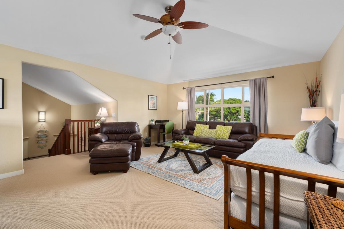 68-1122 Na Ala Hele Road, Unit H22 Kamuela, HI 96743 - Photo 21 of 30 a living room with furniture ceiling fan and a window