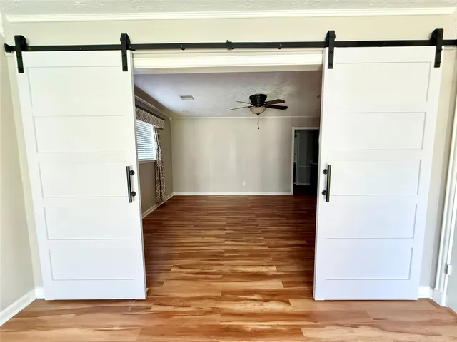 a view of a bathroom from the hallway