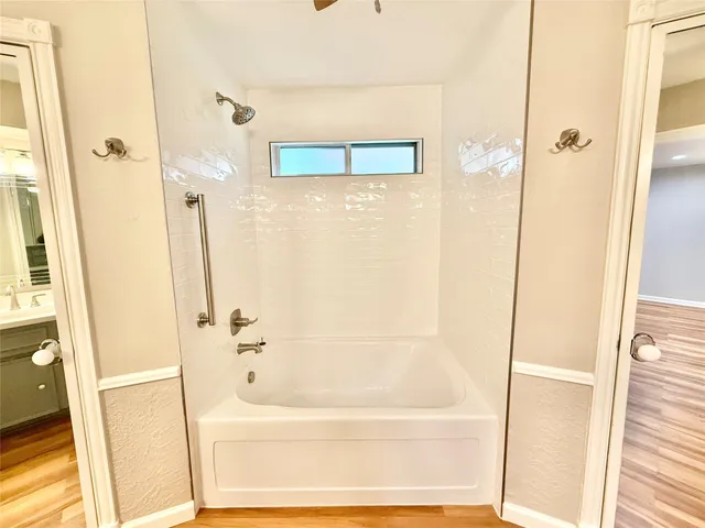 a kitchen with wooden cabinets and a sink