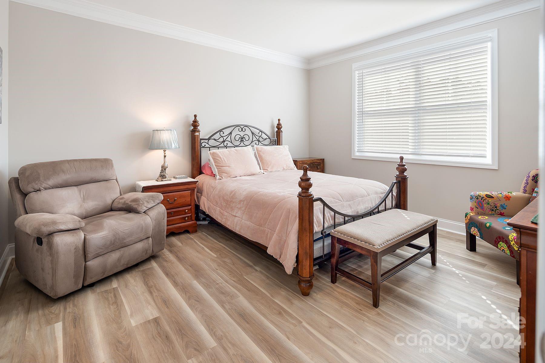 118 East Northstone Road Mooresville, NC 28115 - Photo 12 of 33 a bedroom with furniture and a window