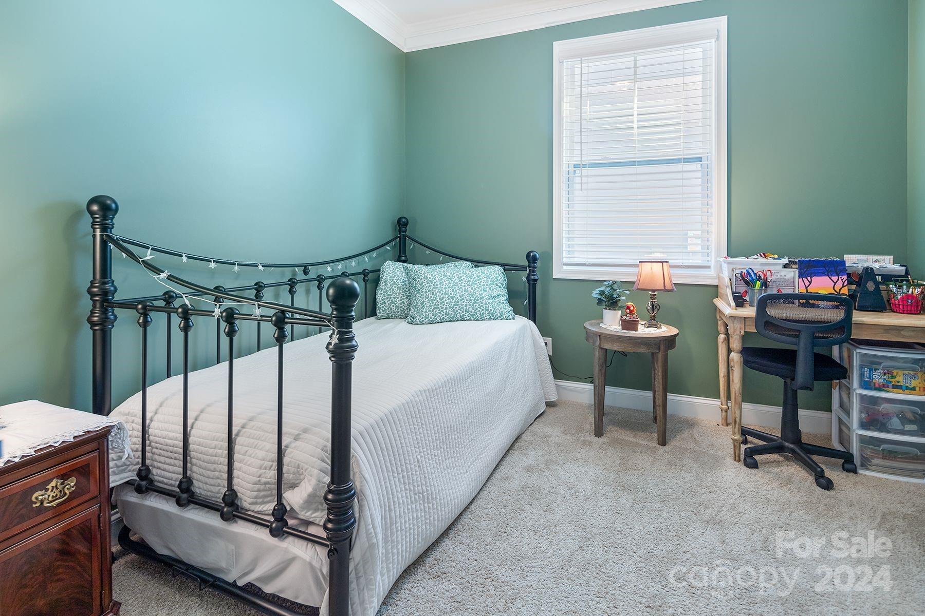 118 East Northstone Road Mooresville, NC 28115 - Photo 21 of 33 a bed room with furniture and a window