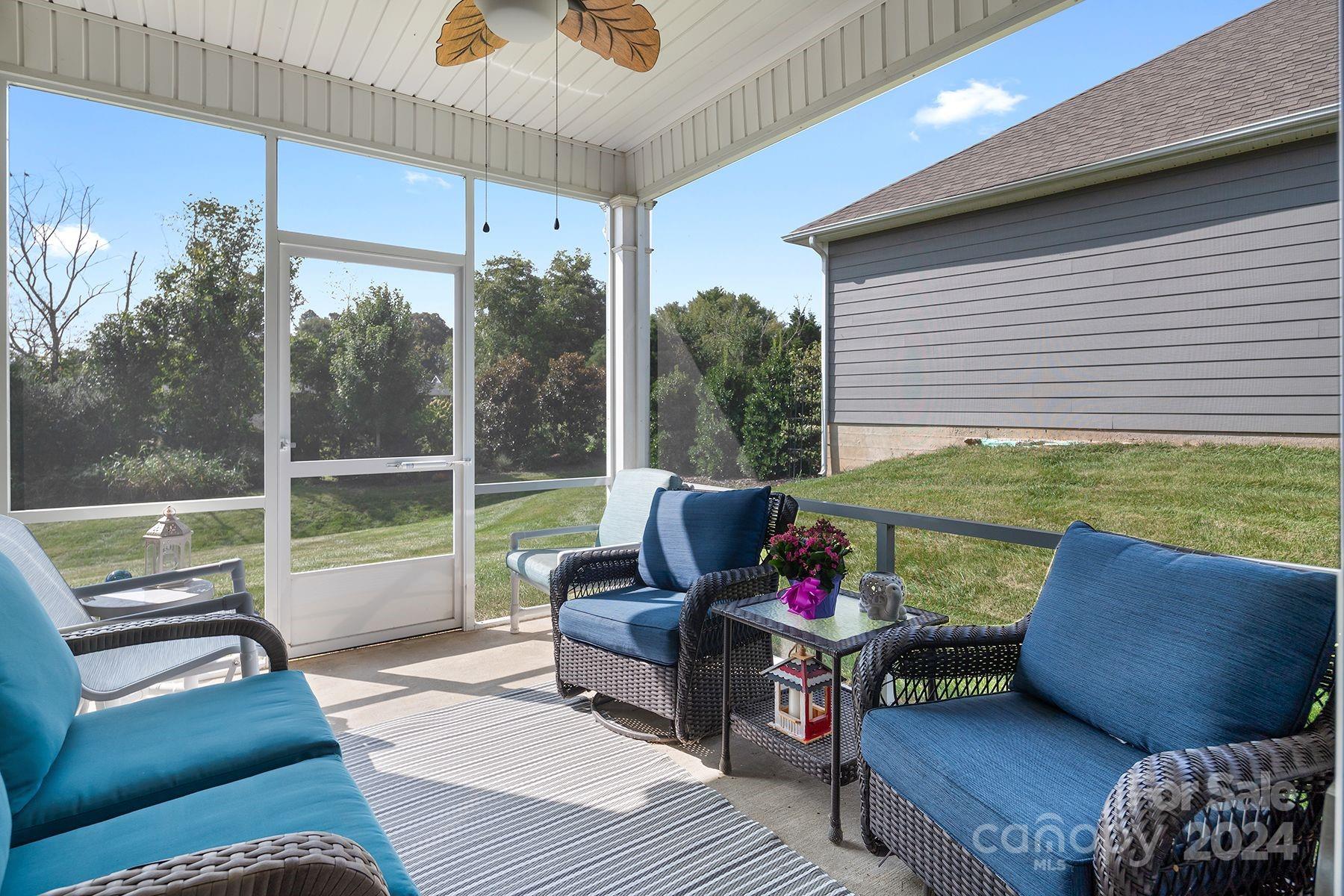 118 East Northstone Road Mooresville, NC 28115 - Photo 24 of 33 a outdoor living space with furniture and a flat screen tv