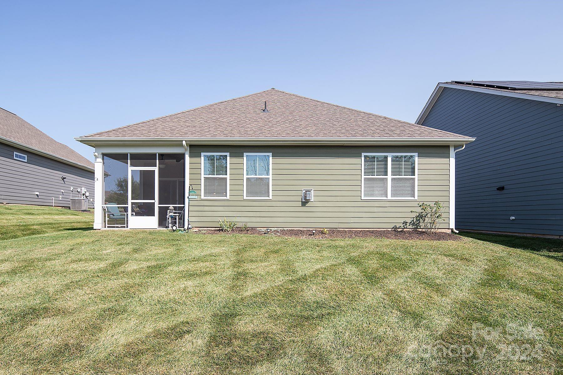 118 East Northstone Road Mooresville, NC 28115 - Photo 26 of 33 a front view of a house with a yard