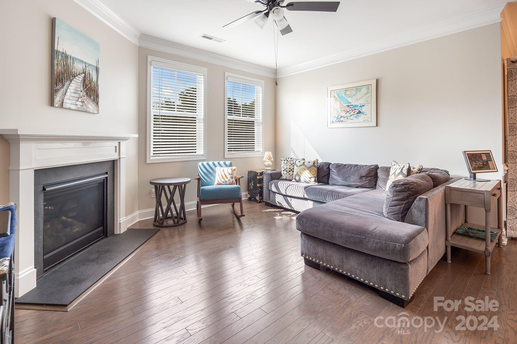 118 East Northstone Road Mooresville, NC 28115 - Photo 10 of 33 a living room with furniture and a fireplace