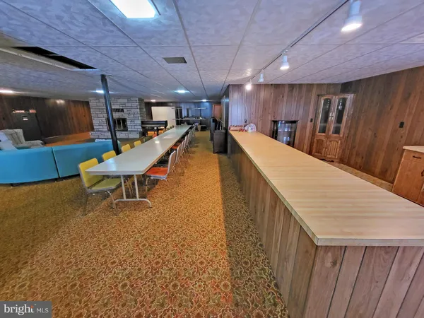 a room with wooden furniture and furniture