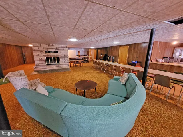 a view of a swimming pool with seating area