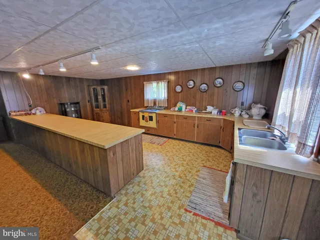 a large room with wooden floors