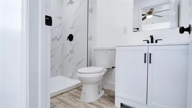 a bathroom with a toilet and a sink