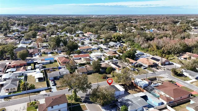 an aerial view of a city with lots of residential buildings