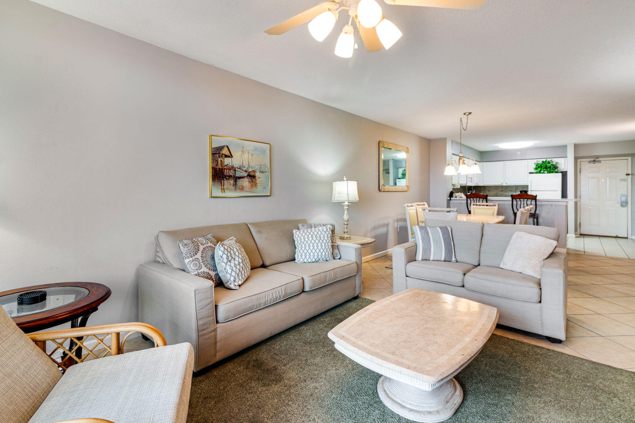 970 Highway 98, Unit 303 Destin, FL 32541 - Photo 6 of 42 a living room with furniture and a chandelier