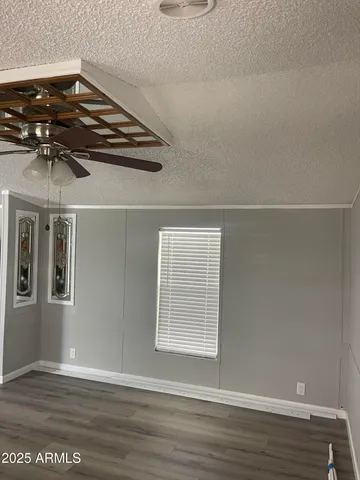 a view of a livingroom with wooden floor