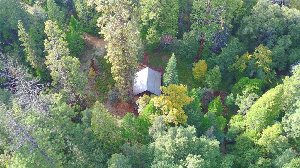6180 Chowchilla Mountain Road Mariposa, CA 95338 - Photo 7 of 11 an aerial view of a house with a yard