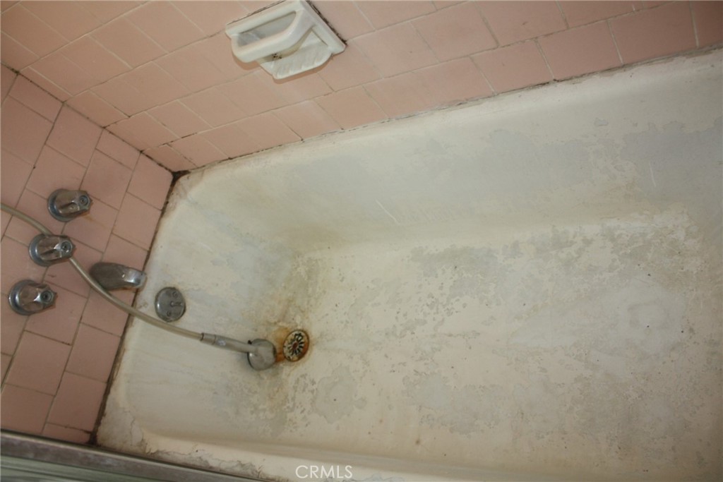 6458 Rhonda Road Riverside, CA 92504 - Photo 27 of 47 a bathroom with a shower