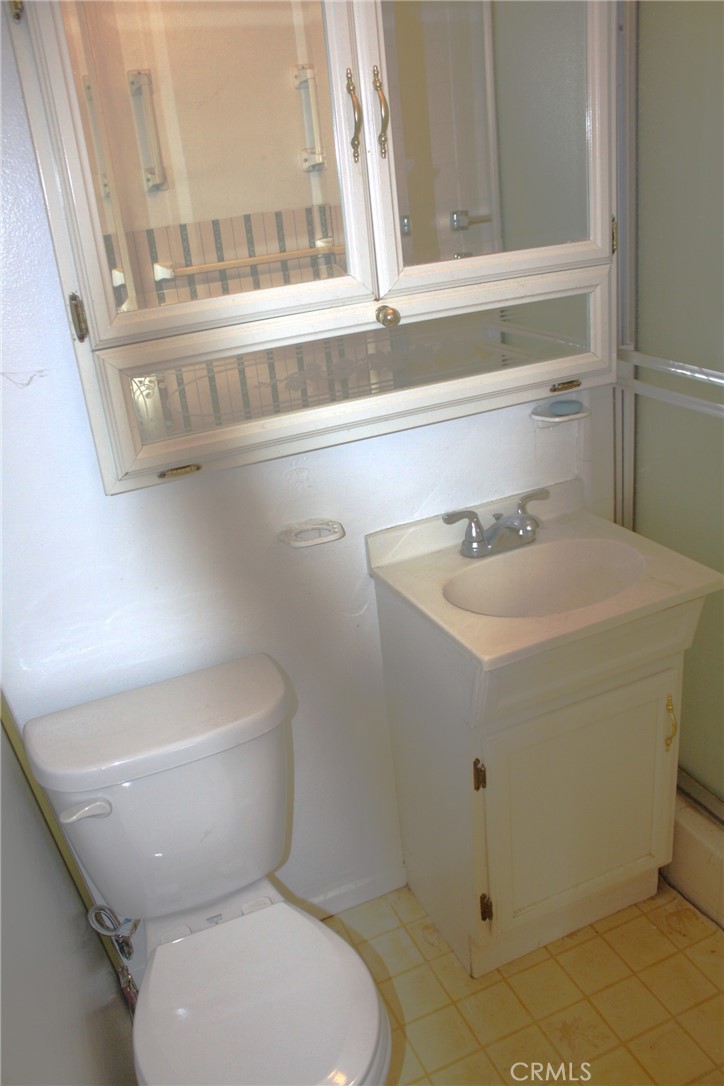 6458 Rhonda Road Riverside, CA 92504 - Photo 39 of 47 a bathroom with a sink and a toilet
