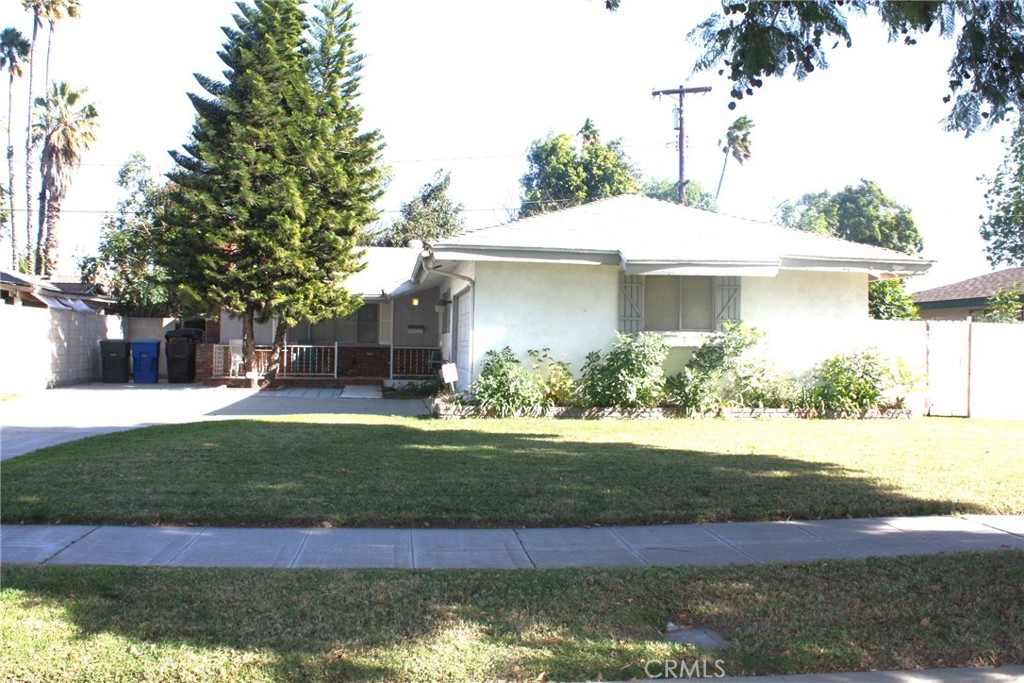 6458 Rhonda Road Riverside, CA 92504 - Photo 4 of 47 a front view of a house with a yard