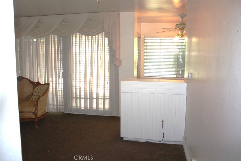 6458 Rhonda Road Riverside, CA 92504 - Photo 10 of 47 a view of an empty room with a window