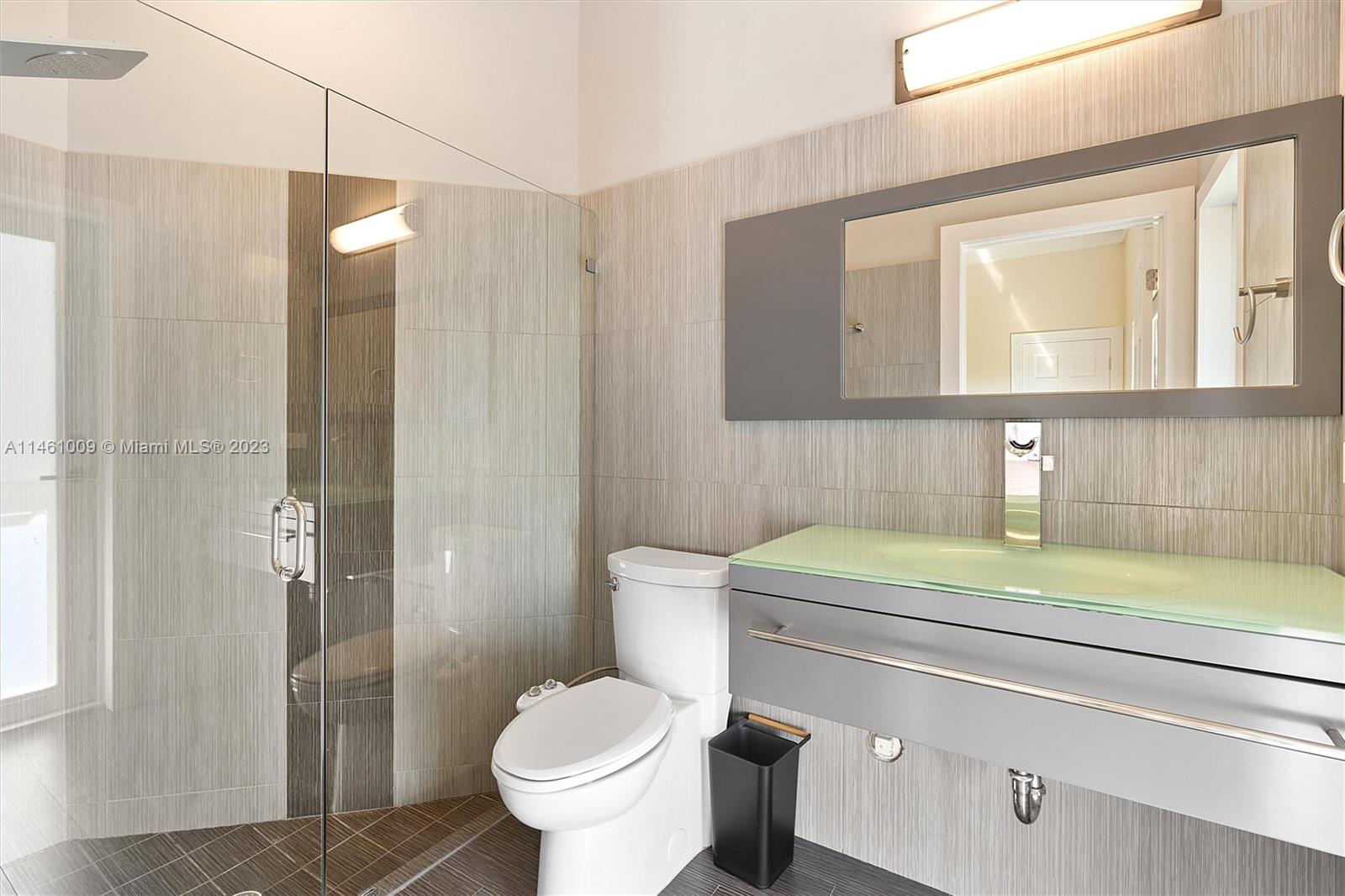 3088 Birkdale Drive Weston, FL 33332 - Photo 29 of 41 a bathroom with a sink a toilet and shower