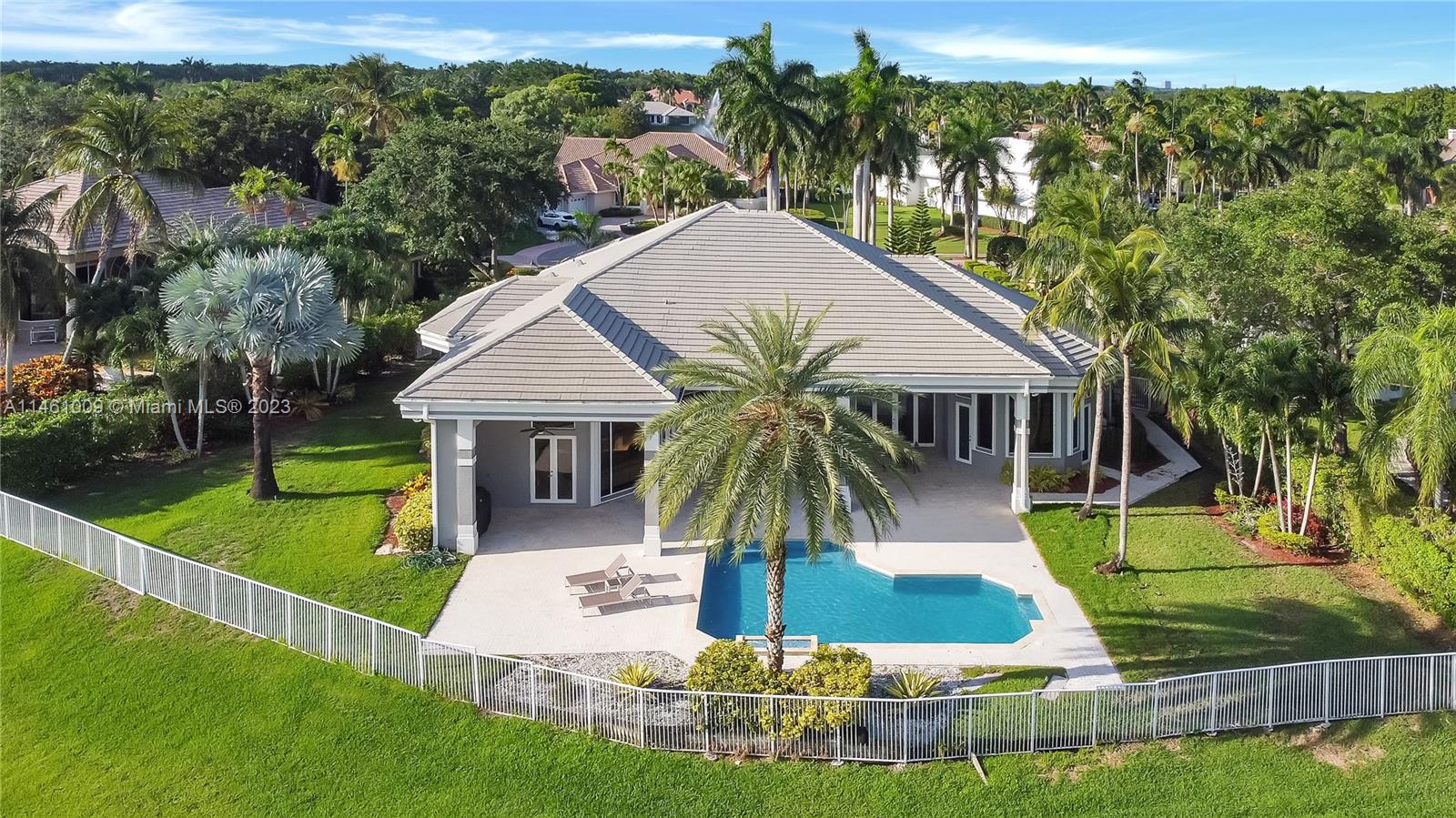 3088 Birkdale Drive Weston, FL 33332 - Photo 7 of 41 a view of house with garden