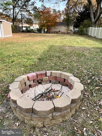 a view of a swimming pool with a lounge chair