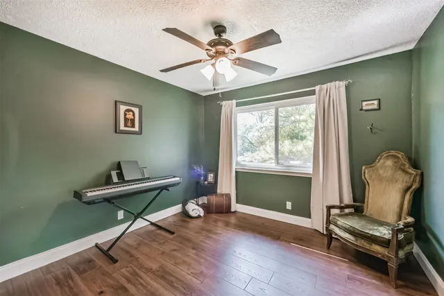 a work room with furniture and windows