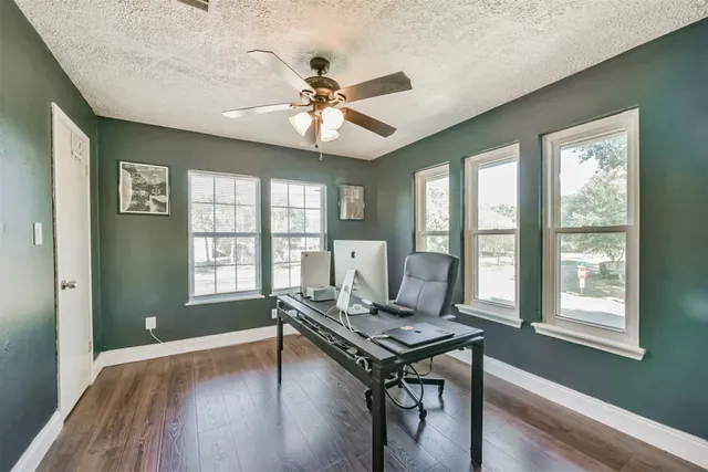 a workspace with wooden floor