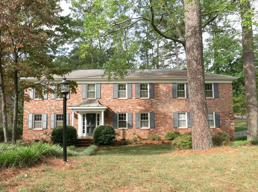 1120 Country Ridge Drive Raleigh, NC 27609 - Photo 1 of 25 SPACIOUS 5BR/3.5BA/3139sf 2-story in Midtown's Quail Hollow w/pool & tennis available! Near shops/dining/Eastgate Park/I-440! All brick home on lg wooded, landscaped corner lot w/big Patio & attached side-load 2-car Garage. Exterior Front