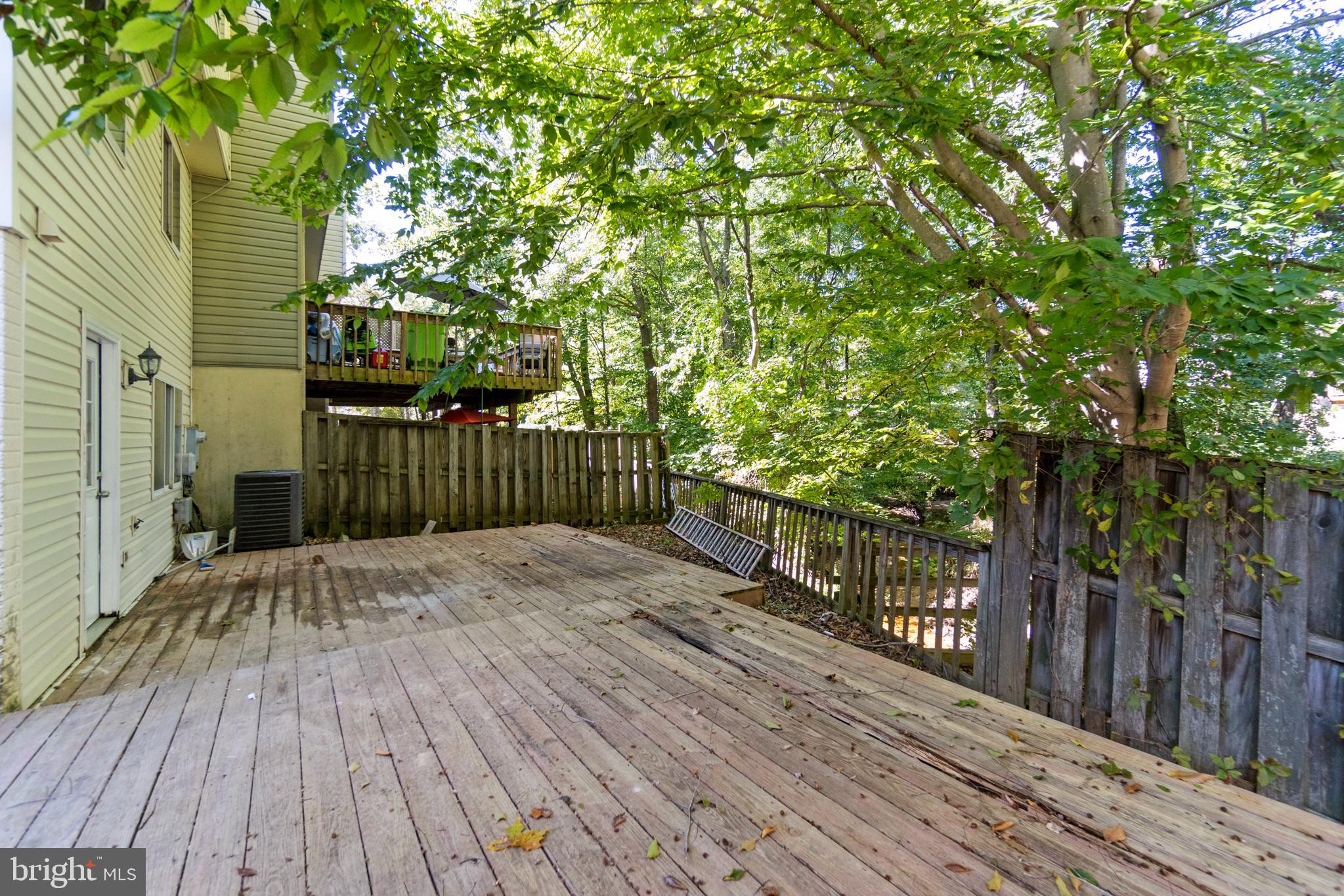 3618 Wharf Lane Triangle, VA 22172 - Photo 22 of 27 a view of balcony with wooden floor and fence