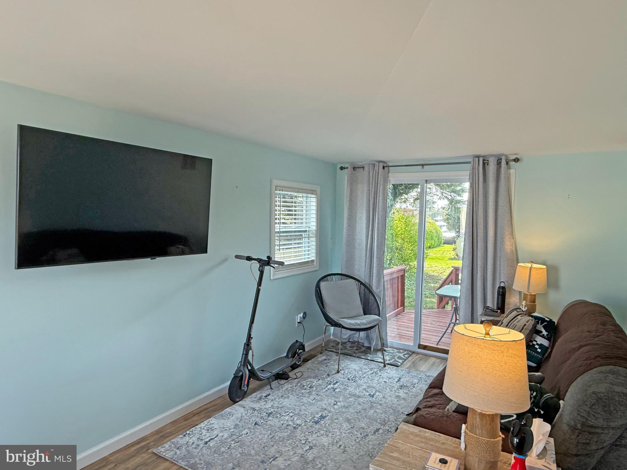 21730 E Street, Unit E29 Rehoboth Beach, DE 19971 - Photo 4 of 31 Living Room