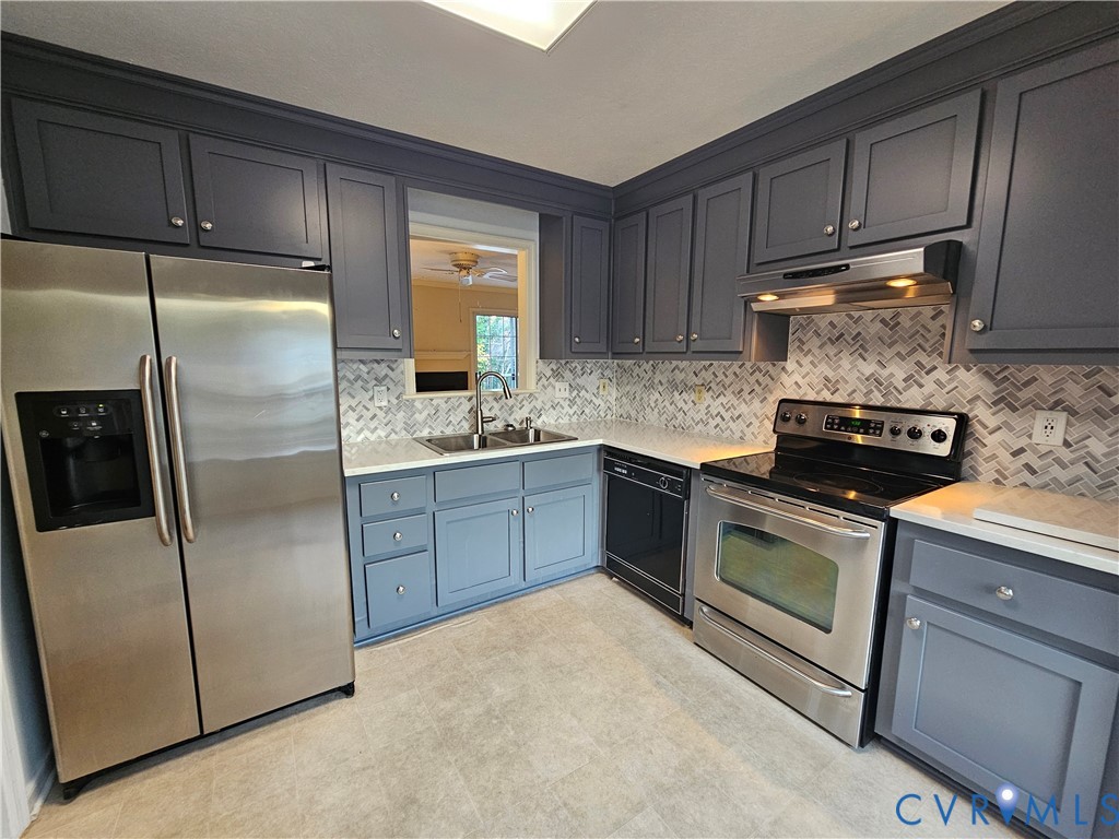 8002 Galaxie Circle Henrico, VA 23228 - Photo 16 of 49 a kitchen with stainless steel appliances granite countertop a refrigerator a stove a sink and a microwave