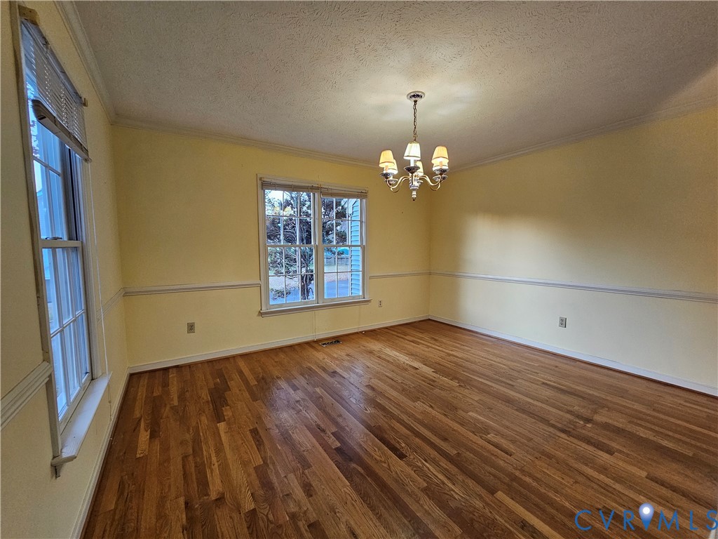 8002 Galaxie Circle Henrico, VA 23228 - Photo 19 of 49 Unfurnished room with ornamental molding, dark woo