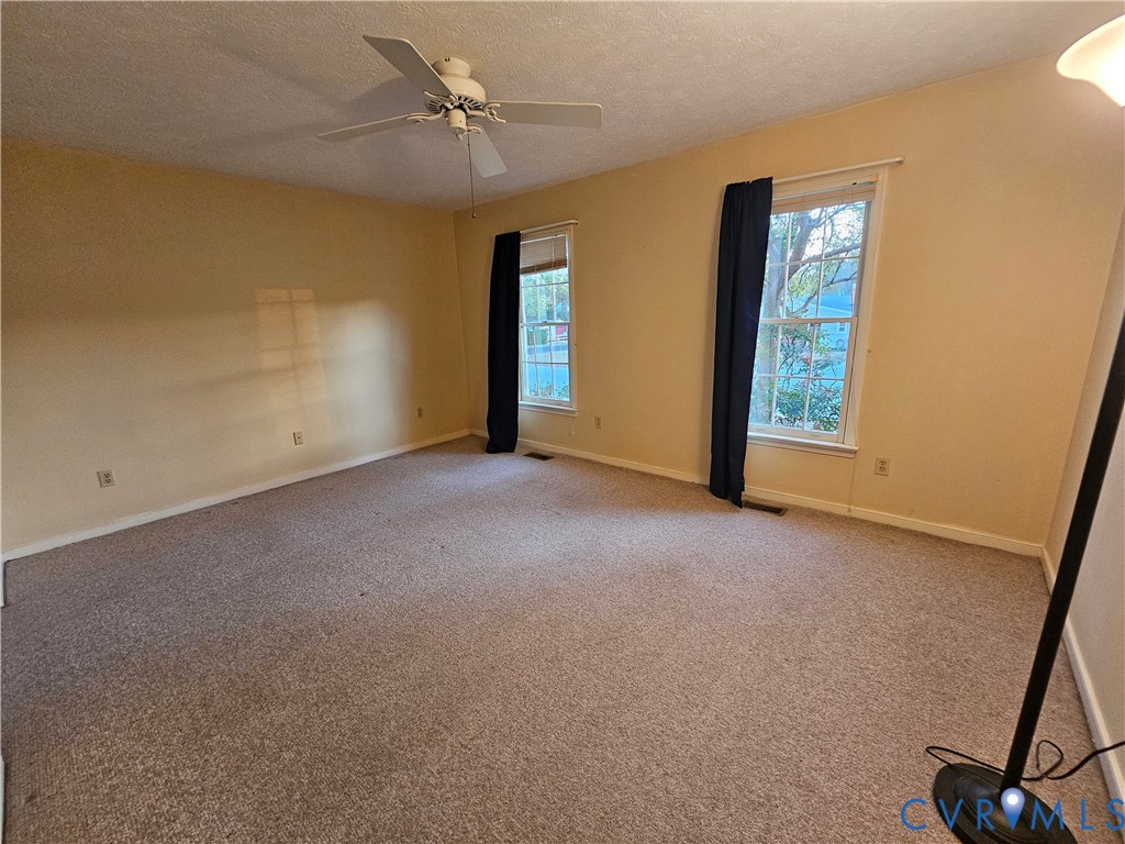 8002 Galaxie Circle Henrico, VA 23228 - Photo 23 of 49 a view of an empty room with a window