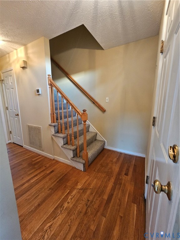 8002 Galaxie Circle Henrico, VA 23228 - Photo 29 of 49 a view of entryway and hall with wooden floor