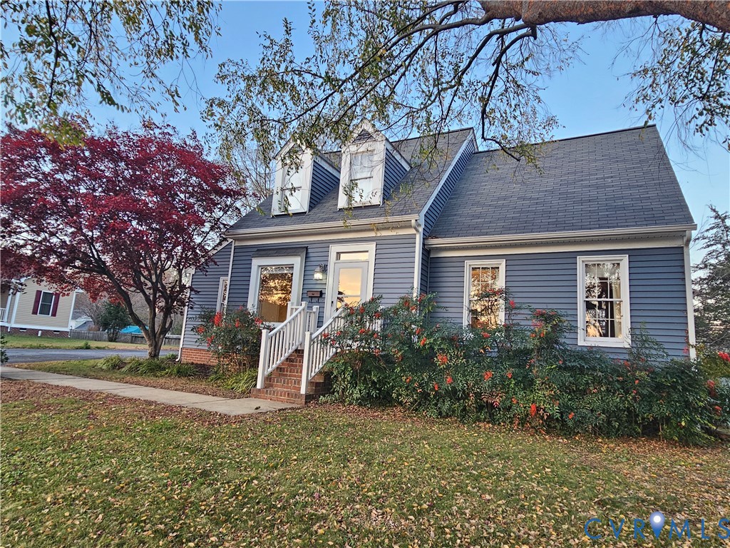 8002 Galaxie Circle Henrico, VA 23228 - Photo 3 of 49 a front view of a house with a yard