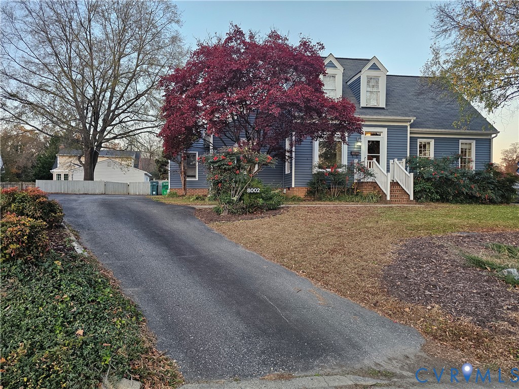 8002 Galaxie Circle Henrico, VA 23228 - Photo 4 of 49 a front view of a house with a yard and garage