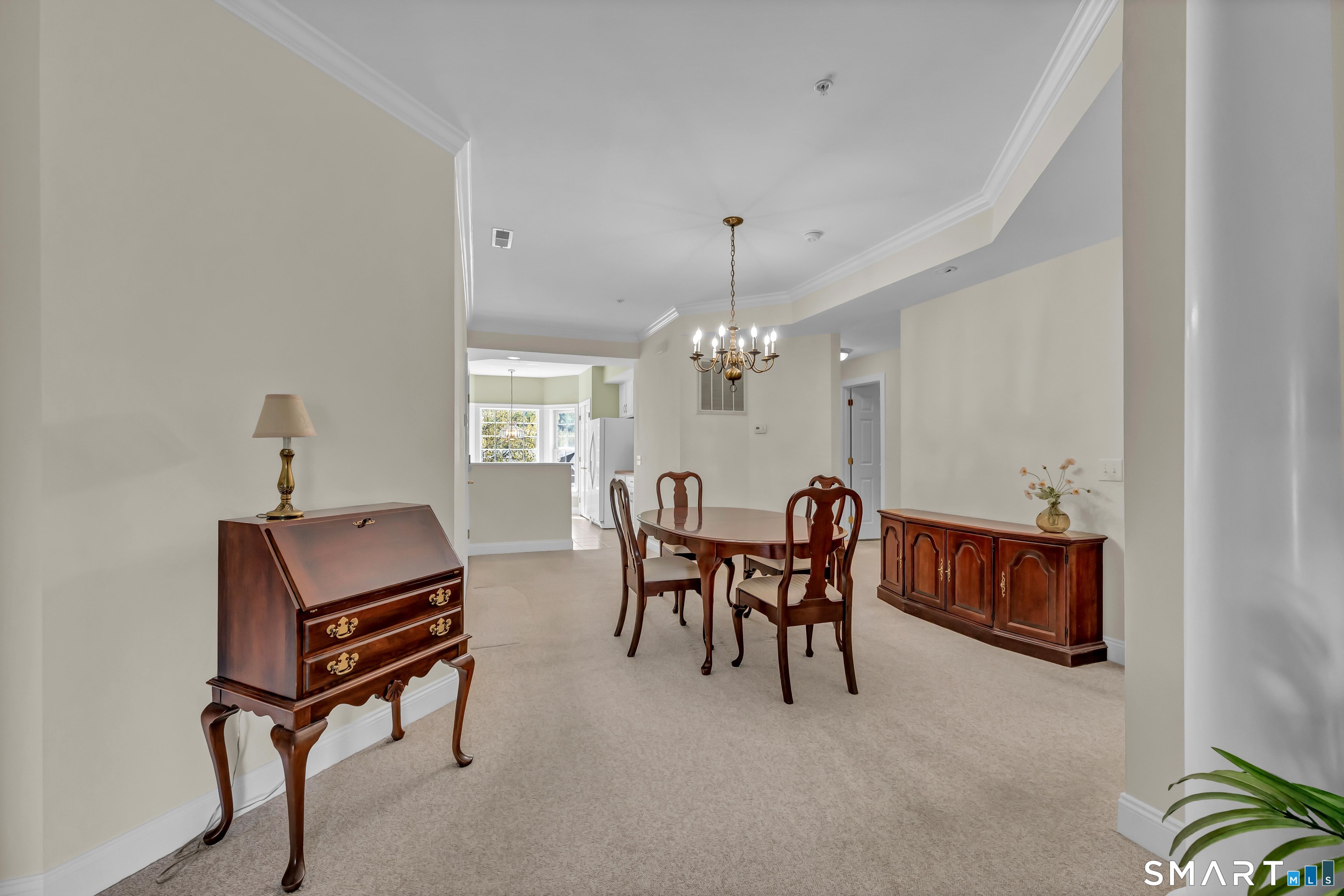 10 Hayestown Road, Unit 321 Danbury, CT 06811 - Photo 11 of 39 a view of a livingroom with furniture and a window