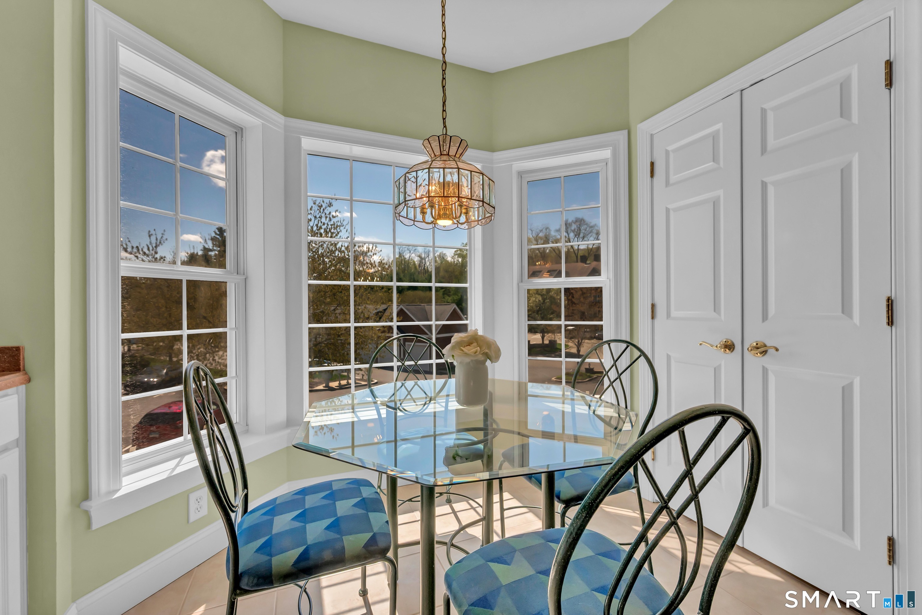 10 Hayestown Road, Unit 321 Danbury, CT 06811 - Photo 14 of 39 a dining room with furniture window and outside view