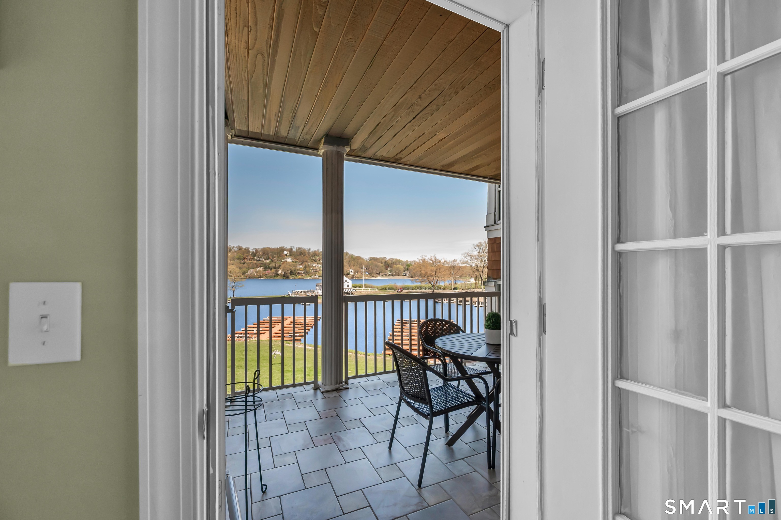 10 Hayestown Road, Unit 321 Danbury, CT 06811 - Photo 20 of 39 a balcony view with a couple of chairs