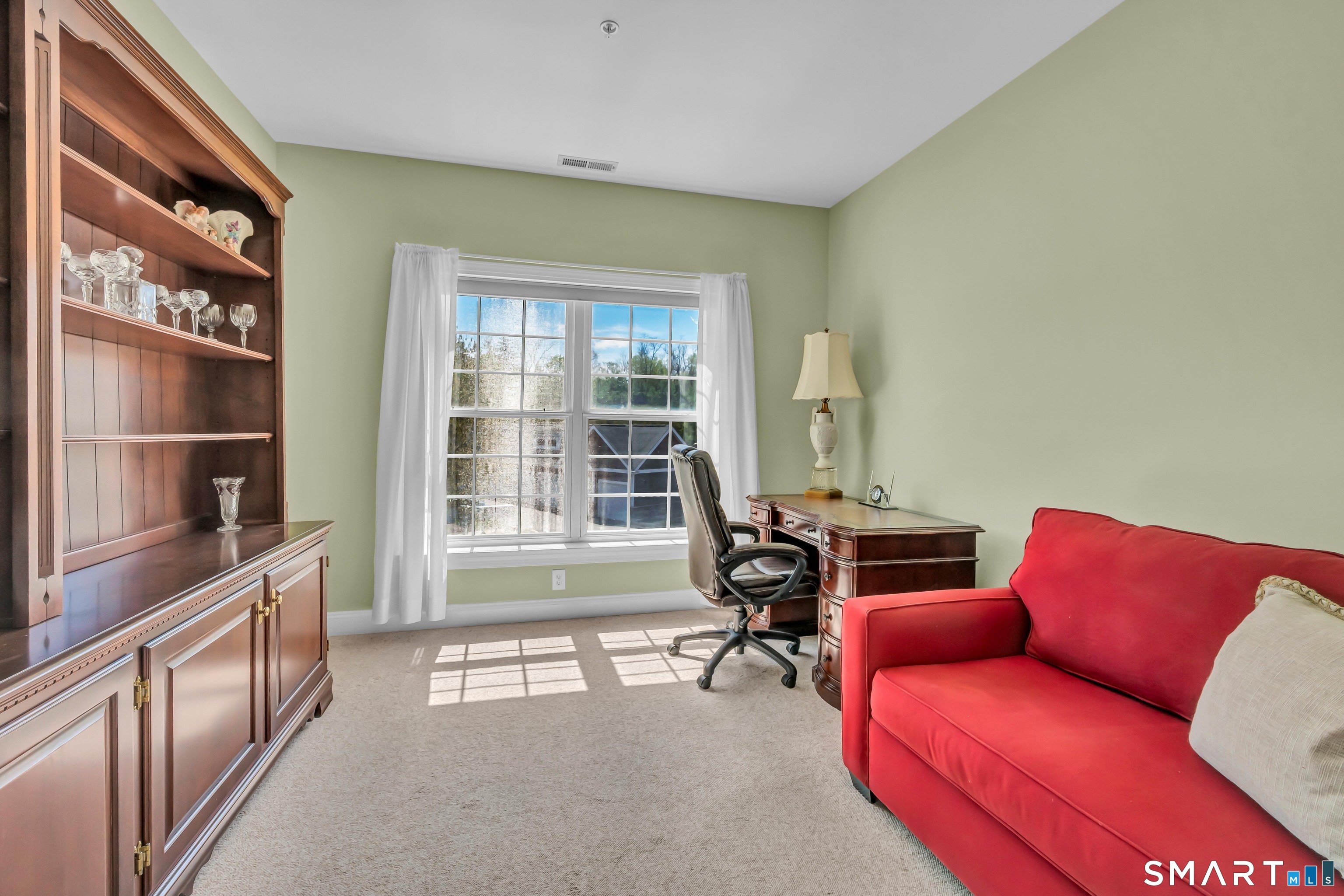 10 Hayestown Road, Unit 321 Danbury, CT 06811 - Photo 26 of 39 a living room with furniture and a window