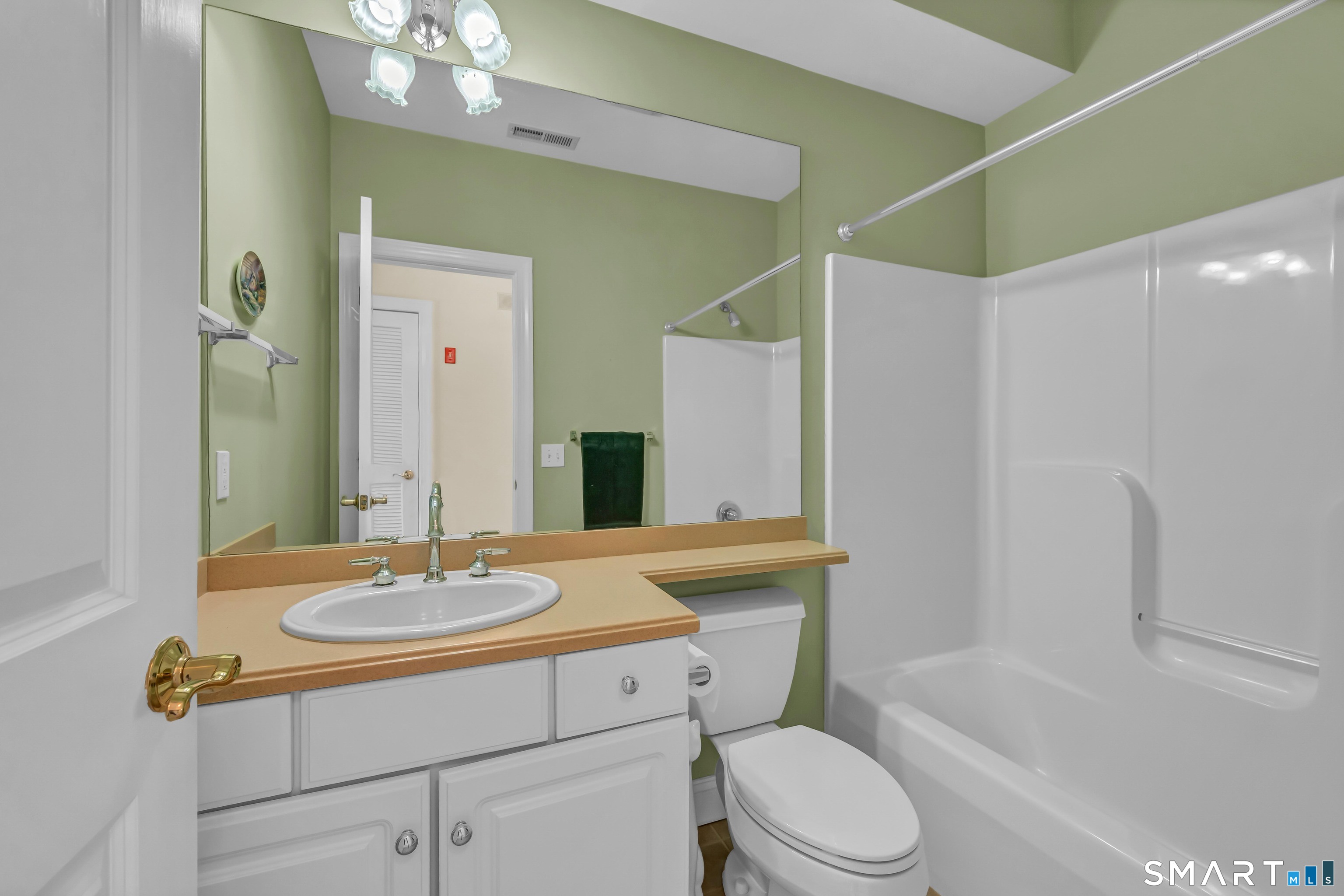 10 Hayestown Road, Unit 321 Danbury, CT 06811 - Photo 27 of 39 a bathroom with a sink toilet and shower