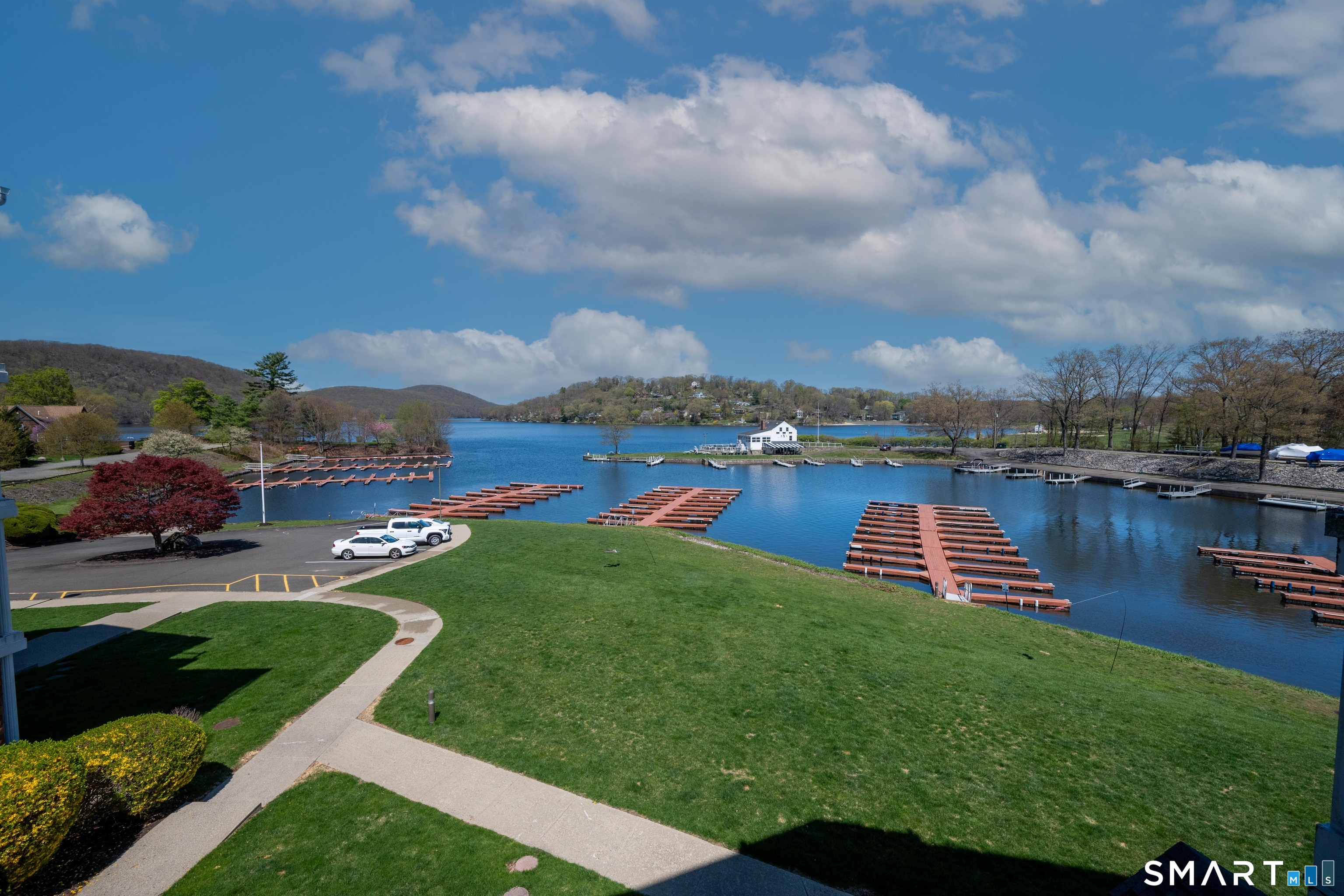 10 Hayestown Road, Unit 321 Danbury, CT 06811 - Photo 33 of 39 a view of a lake with houses