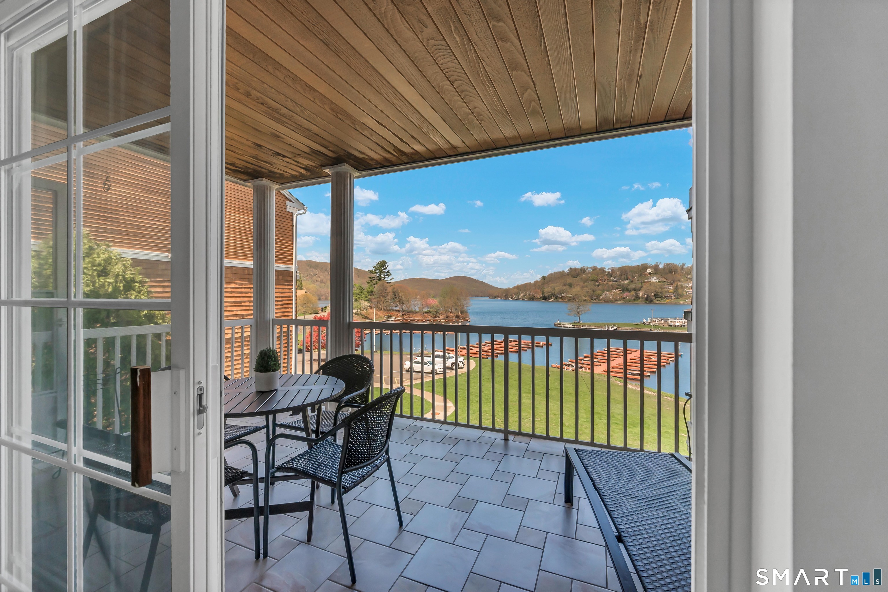 10 Hayestown Road, Unit 321 Danbury, CT 06811 - Photo 9 of 39 a balcony with furniture and city view