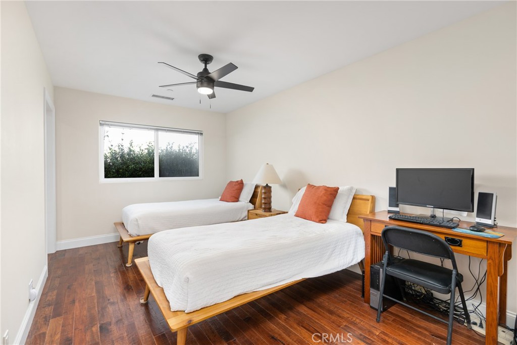 33872 Granada Drive Dana Point, CA 92629 - Photo 15 of 27 a bedroom with a bed and a flat screen tv