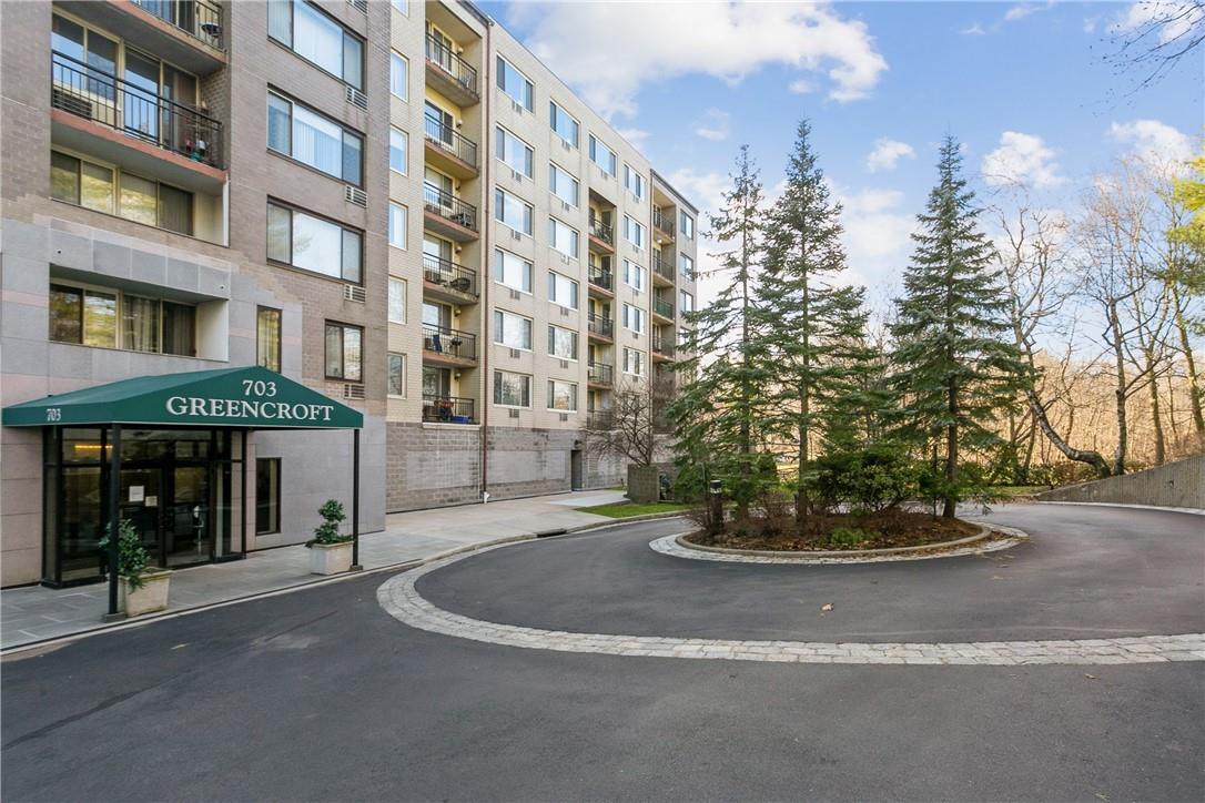 a view of a building with a street