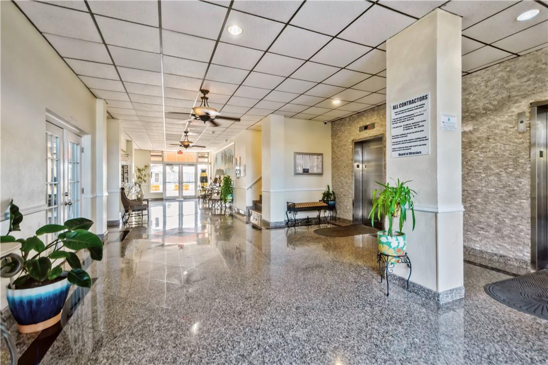 200 South Birch Road, Unit 612 Fort Lauderdale, FL 33316 - Photo 3 of 32 a lobby with furniture and a potted plant
