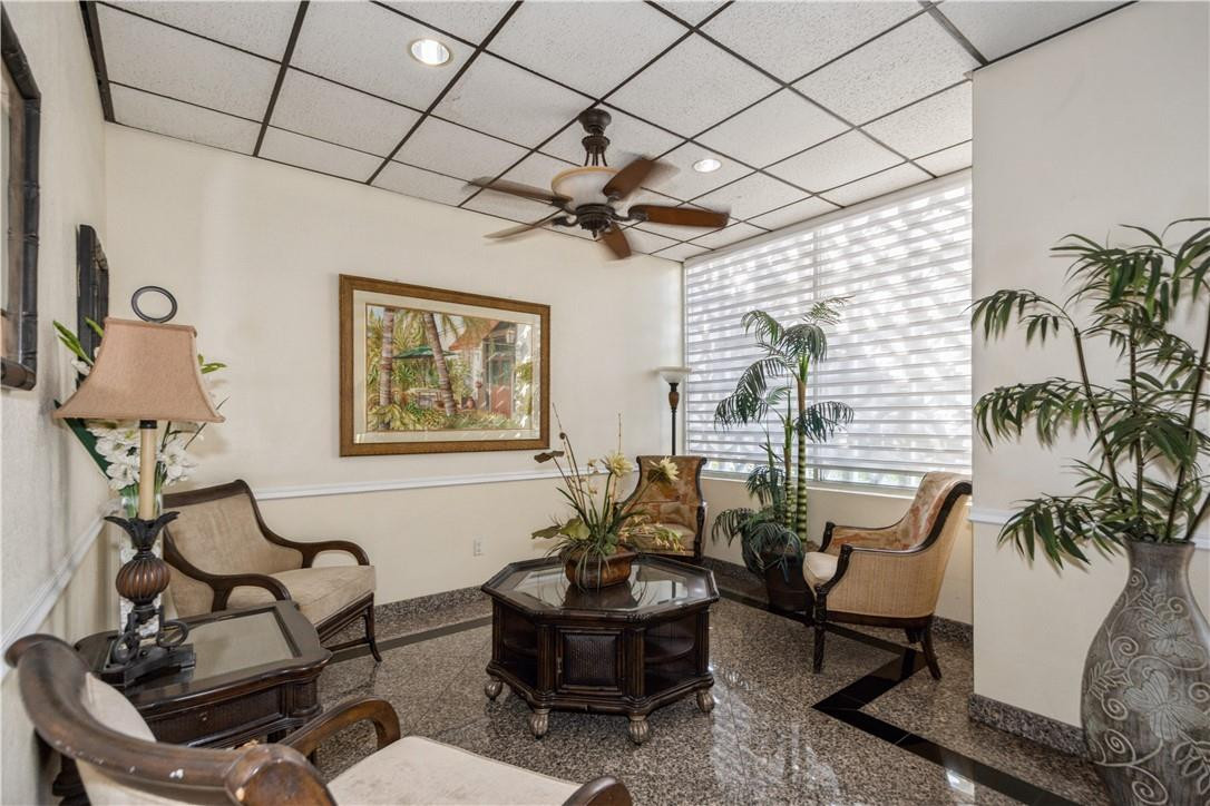 200 South Birch Road, Unit 612 Fort Lauderdale, FL 33316 - Photo 5 of 32 a living room with couches chairs and a potted plant