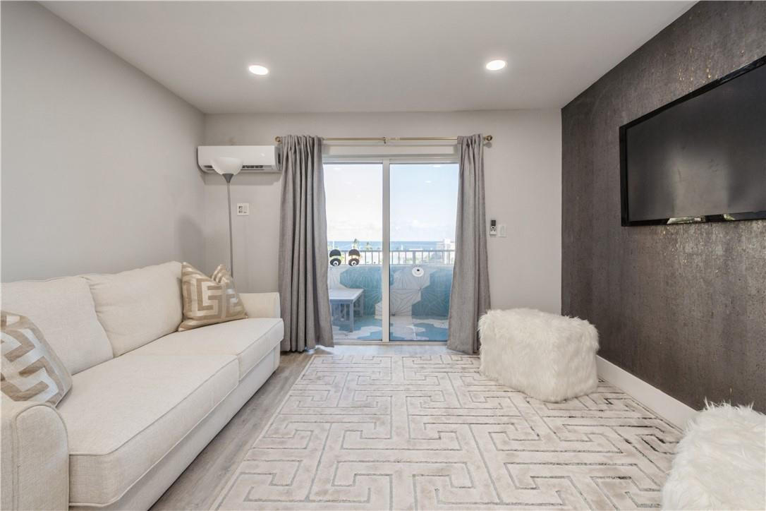 200 South Birch Road, Unit 612 Fort Lauderdale, FL 33316 - Photo 7 of 32 a bedroom with a large bed and a flat screen tv